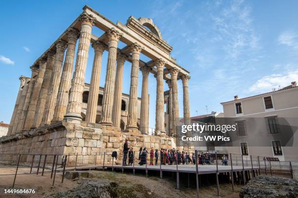 Children in costume outside of the Temple of Diana, Merida, Spain.