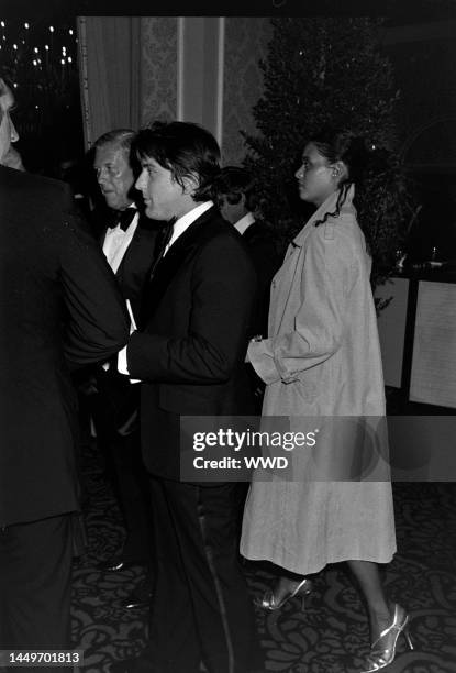 Robert De Niro and Diahnne Abbott attend an American Film Institute event at the Beverly Hilton Hotel in Beverly Hills, California, on March 2, 1977.