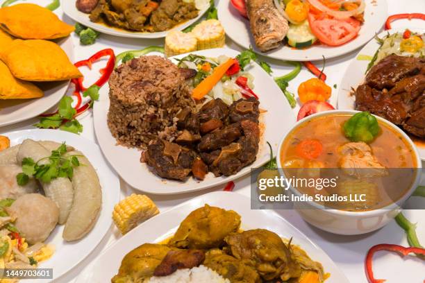 a collection of traditional caribbean food - jamaican culture stock-fotos und bilder