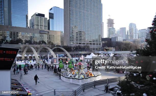 holiday fair in nathan phillips square, toronto, canada - toronto sign stock pictures, royalty-free photos & images