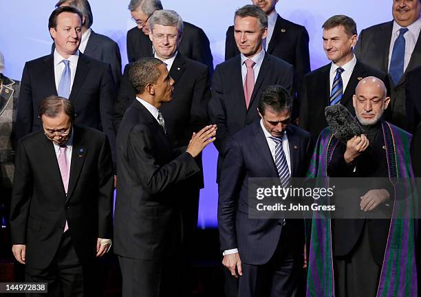 Secretary General Ban Ki-moon, U.S. President Barack Obama, NATO Secretary General Anders Fogh Rasmussen, Afghan President Hamid Karzai British Prime...