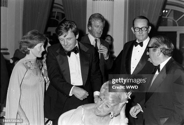 Jennifer Lynton , Anthony Hopkins , Rosemary Levine , and Joseph E. Levine attend a movie premiere, with an afterparty at the Plaza Hotel, in New...