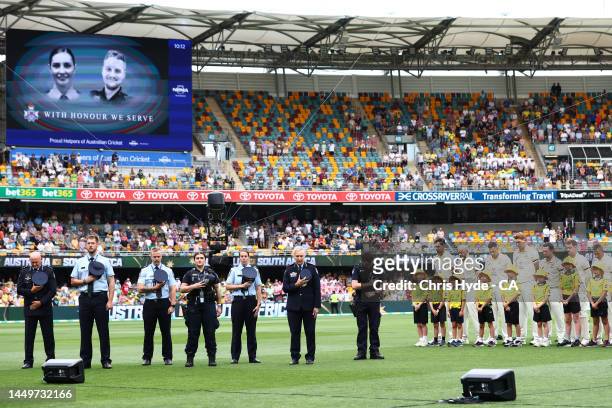 Queensland Police Officers are seen as they pay their respects to Constable Matthew Arnold and Constable Rachel McCrow, 29 during day one of the...