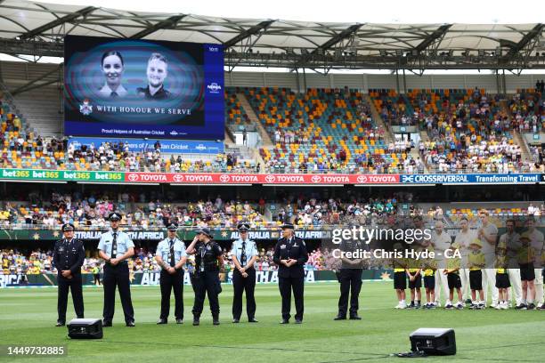 Queensland Police Officers are seen as they pay their respects to Constable Matthew Arnold and Constable Rachel McCrow, 29 during day one of the...