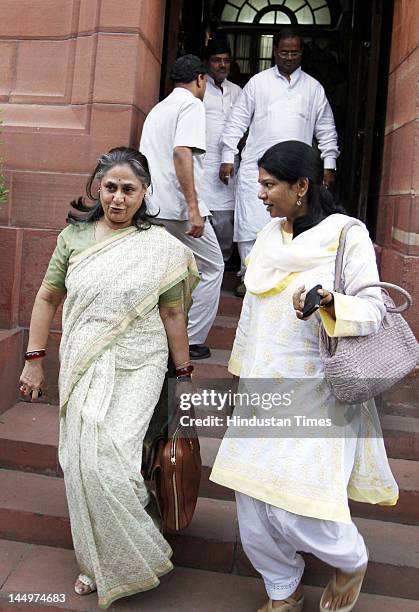 Samajwadi Party Rajyasabha MP Jaya Bachchan with DMK Rajyasabha MP Kanimozhi exit after attending the Budget Session at Parliament house on May 21,...