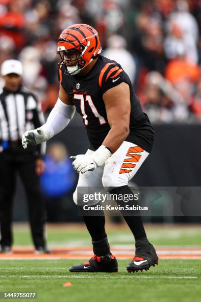 La'el Collins of the Cincinnati Bengals blocks during an NFL football game against the Cleveland Browns at Paycor Stadium on December 11, 2022 in...