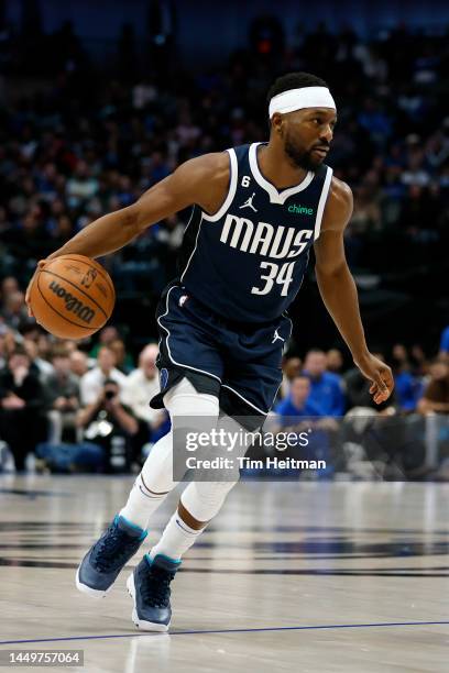 Kemba Walker of the Dallas Mavericks dribbles the ball against the Portland Trail Blazers in the second half of the game at American Airlines Center...