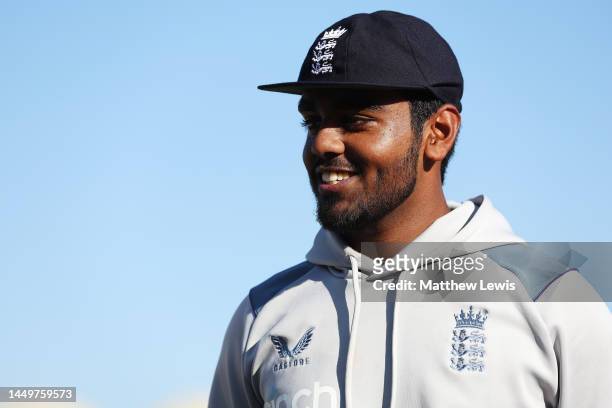 Rehan Ahmed of England pictured after being presented with is first cap during day one of the Third Test match between Pakistan and England at...