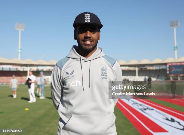 Rehan Ahmed of England pictured with his first test cap during day one of the Third Test match between Pakistan and England at Karachi National...