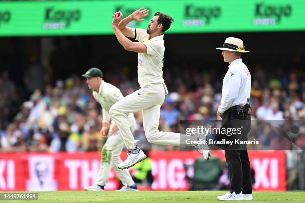 Mitchell Starc of Australia bowls during day one of the First Test match between Australia and South Africa at The Gabba on December 17, 2022 in...