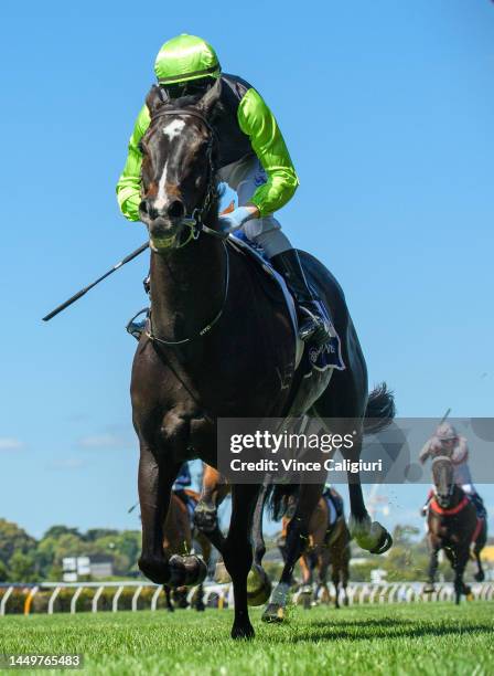 Harry Coffey riding Persan winning Race 6, the Jra Trophy, during Melbourne Racing at Flemington Racecourse on December 17, 2022 in Melbourne,...