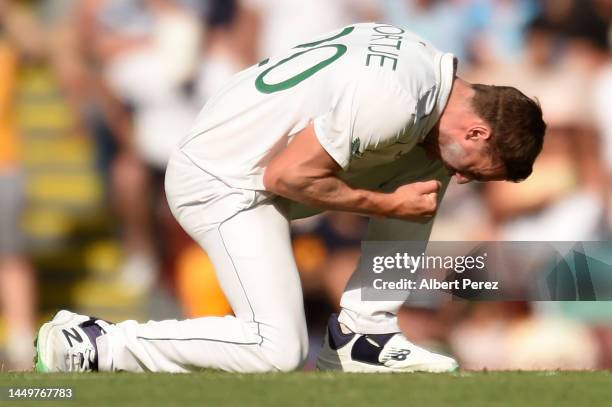 Anrich Nortje of South Africa celebrates taking the wicket of Usman Khawaja of Australia for 11 runs during day one of the First Test match between...