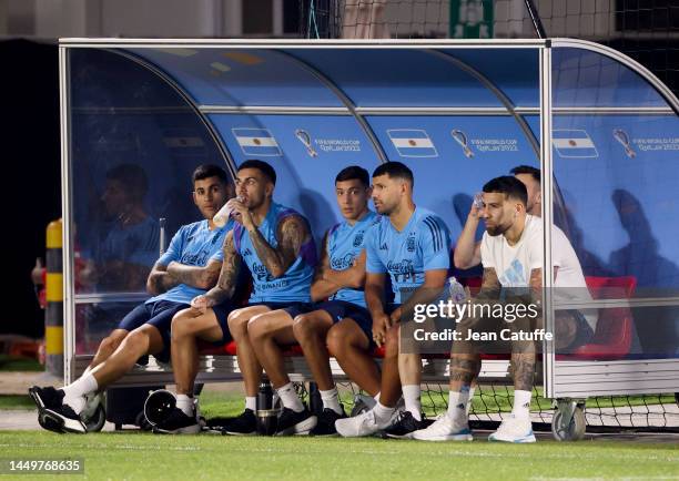 Cristian Romero, Leandro Paredes, Julian Alvarez, Sergio Aguero, Nicolas Otamendi of Argentina during a training session ahead of the World Cup Final...