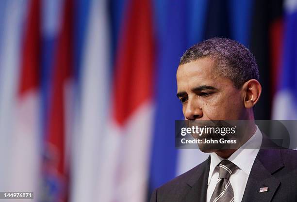 President Barack Obama pauses as he speaks at a press conference closing the NATO summit on May 21, 2012 at McCormick Place in Chicago, Illinois. As...