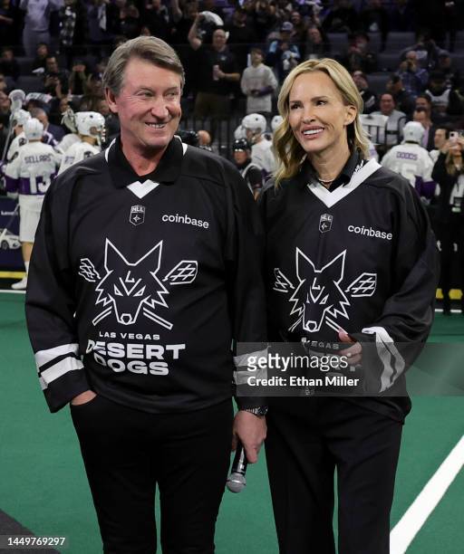 Co-owner Wayne Gretzky of the Las Vegas Desert Dogs and his wife Janet Gretzky are introduced before the Desert Dogs' inaugural regular-season home...