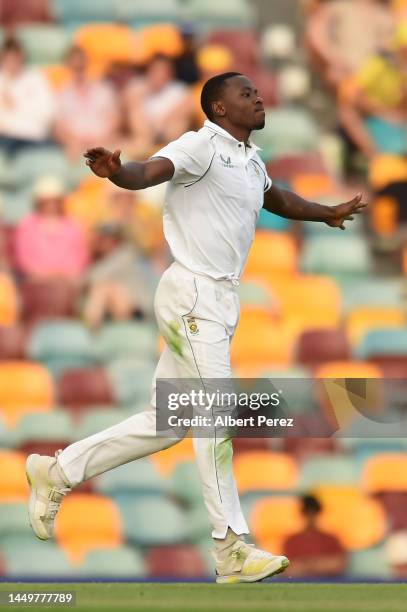 Kagiso Rabada of South Africa celebrates taking he wicket of Scott Boland of Australia for 1 run during day one of the First Test match between...