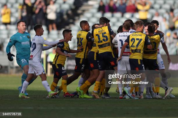 Both teams tussle during the round eight A-League Men's match between Central Coast Mariners and Sydney FC at Central Coast Stadium, on December 17...