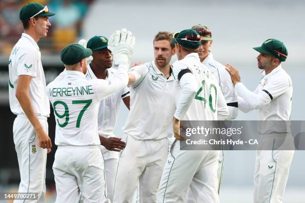 Anrich Nortje of South Africa celebrates taking the wicket of Steve Smith of Australia during day one of the First Test match between Australia and...