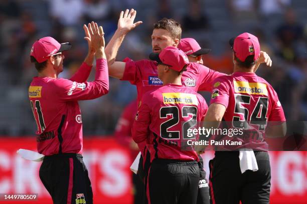 Jackson Bird of the Sixers celebrates the wicket of Adam Lyth of the Scorchers during the Men's Big Bash League match between the Perth Scorchers and...