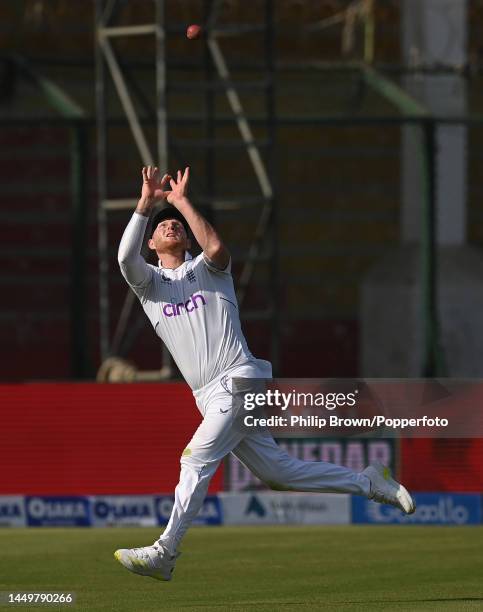 Ben Stokes of England catches Mohammad Rizwan of Pakistan on the first day of the third Test between Pakistan and England at Karachi National Stadium...