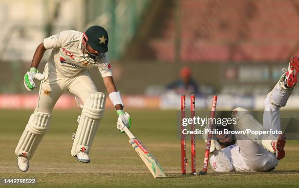 Babar Azam of Pakistan is run out by Ben Foakes on the first day of the third Test between Pakistan and England at Karachi National Stadium on...