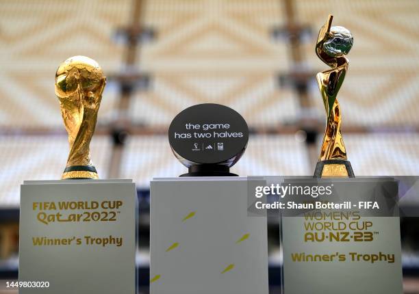 The FIFA World Cup Qatar 2022 Winner's Trophy, adidas half ball and the The FIFA Women's World Cup Australia & New Zealand 2023 Winner's Trophy are...