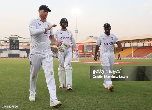 Ben Stokes of England leads his team off the field, after bowling Pakistan all out during day one of the Third Test match between Pakistan and...