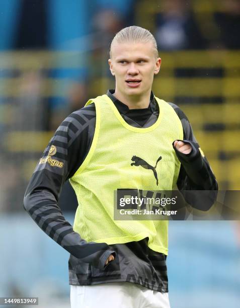 Erling Haaland of Manchester City warms up prior to the friendly match between Manchester City and Girona at Manchester City Academy Stadium on...