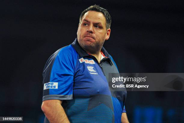 Adrian Lewis of England looks on during his First Round match at the 2022/23 Cazoo World Darts Championship at Alexandra Palace on December 16, 2022...