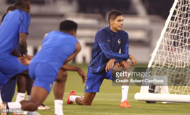Raphael Varane of France looks on during the France Training Session ahead of their World Cup Final match against Argentina at Al Saad SC on December...