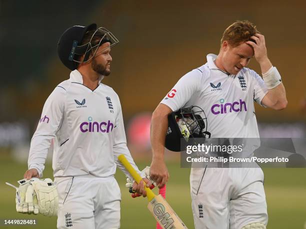 Ben Duckett and Ollie Pope of England leave the field after the first day of the third Test between Pakistan and England at Karachi National Stadium...