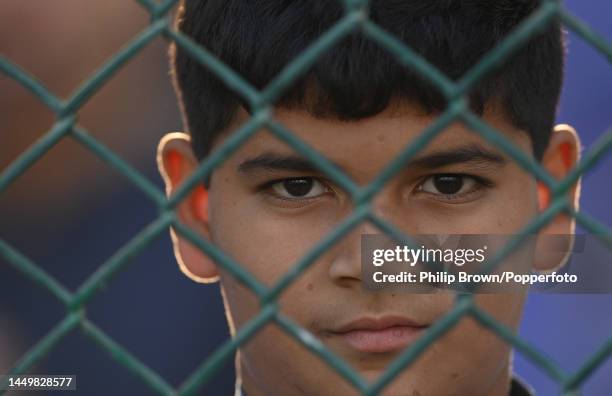 Boy looks on during the first day of the third Test between Pakistan and England at Karachi National Stadium on December 17, 2022 in Karachi,...