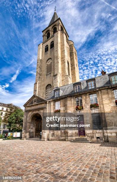 saint-germain-des-prés abbey seen from the place saint-germain-des-prés in paris - saint germain stock pictures, royalty-free photos & images