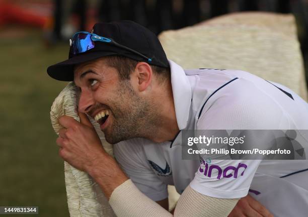 Mark Wood of England laughs during the first day of the third Test between Pakistan and England at Karachi National Stadium on December 17, 2022 in...