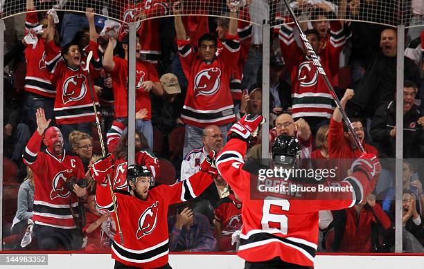 Travis Zajac of the New Jersey Devils celebrates his first period goal with Andy Greene of the New Jersey Devils in Game Four of the Eastern...