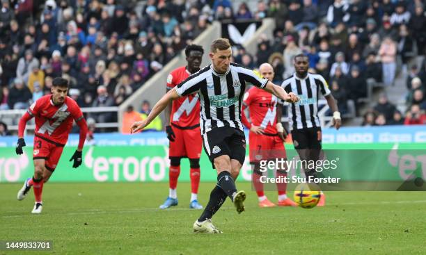 Newcastle striker Chris Wood shoots to score the second goal from the penalty spot during the friendly match between Newcastle United and Rayo...
