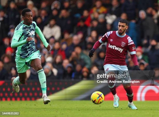 Tosin of Fulham and Said Benrahma of West Ham battle for the ball during the friendly match between Fulham and West Ham United at Craven Cottage on...