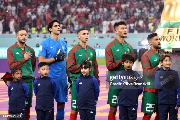 Morocco players line up for the national anthem prior to the FIFA World Cup Qatar 2022 3rd Place match between Croatia and Morocco at Khalifa...