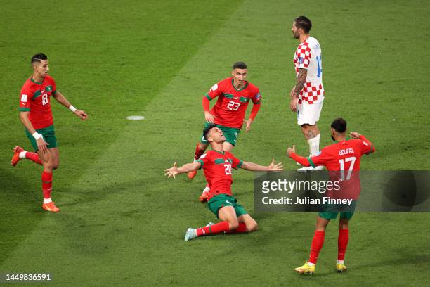 Achraf Dari of Morocco celebrates after scoring the team's first goal during the FIFA World Cup Qatar 2022 3rd Place match between Croatia and...