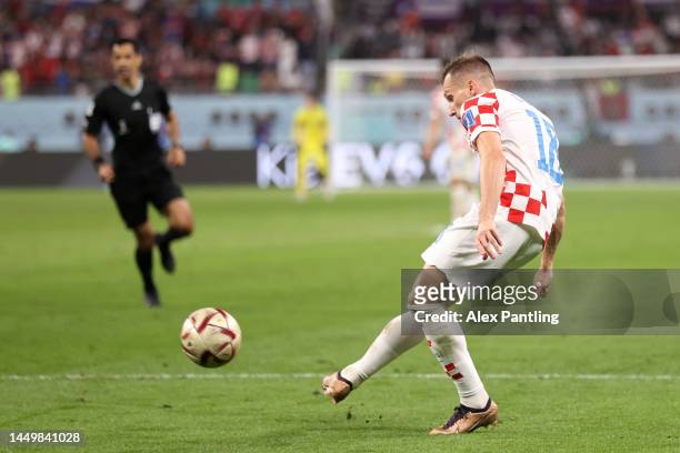 Mislav Orsic of Croatia scores the team's second goal during the FIFA World Cup Qatar 2022 3rd Place match between Croatia and Morocco at Khalifa...