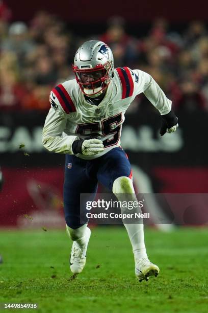 Josh Uche of the New England Patriots defends against the Arizona Cardinals at State Farm Stadium on December 12, 2022 in Glendale, Arizona.