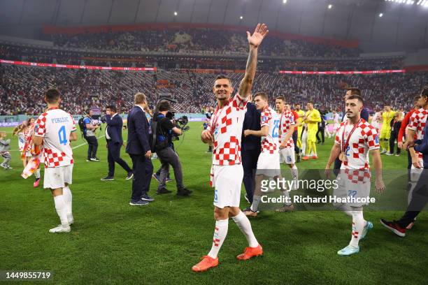 Dejan Lovren of Croatia celebrates with the FIFA World Cup Qatar 2022 third placed medal after the team's victory during the FIFA World Cup Qatar...