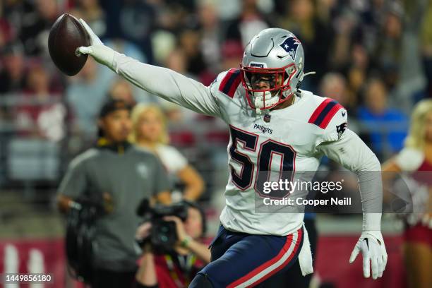 Raekwon McMillan of the New England Patriots celebrates the turnover against the Arizona Cardinals at State Farm Stadium on December 12, 2022 in...