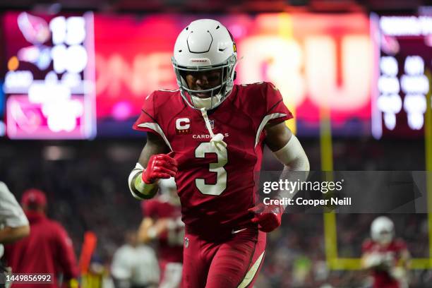 Budda Baker of the Arizona Cardinals runs off of the field against the New England Patriots at State Farm Stadium on December 12, 2022 in Glendale,...