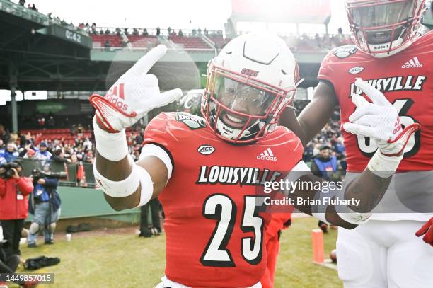 Running back Jawhar Jordan of the Louisville Cardinals reacts after scoring a touchdown against the Cincinnati Bearcats during the second quarter of...