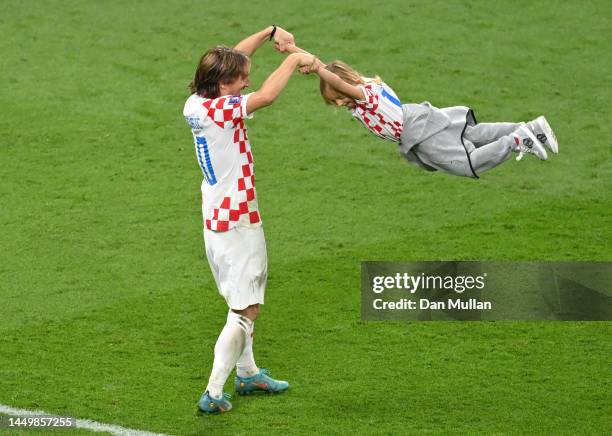 Luka Modric of Croatia celebrates with his children after the 2-1 win during the FIFA World Cup Qatar 2022 3rd Place match between Croatia and...