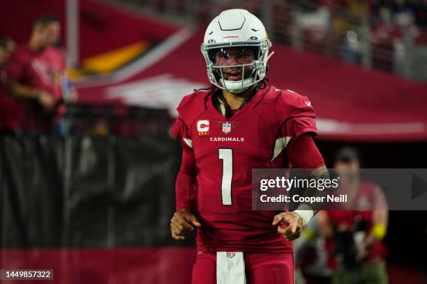 Kyler Murray of the Arizona Cardinals runs onto the field against the New England Patriots at State Farm Stadium on December 12, 2022 in Glendale,...