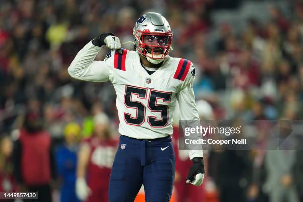 Josh Uche of the New England Patriots celebrates against the Arizona Cardinals at State Farm Stadium on December 12, 2022 in Glendale, Arizona.