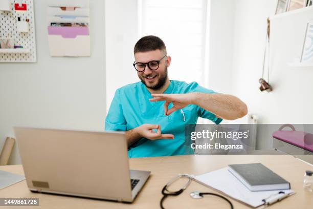Dr In Sign Language 118 Sign Language Interpreter Hospital Stock Photos, High-Res Pictures ...