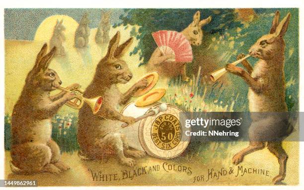 chromolithograph of rabbit band in meadow at night - hare stock illustrations